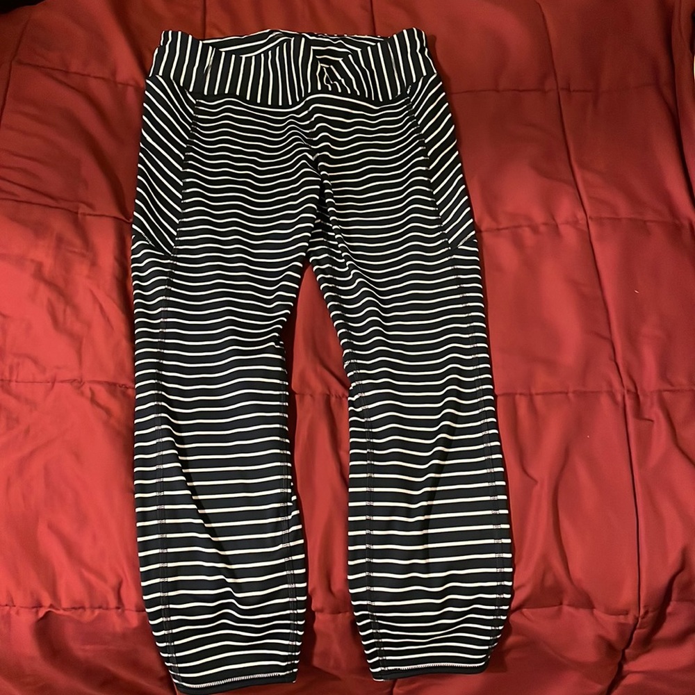 Athleta tights. Navy blue w/ white stripes. Size L.